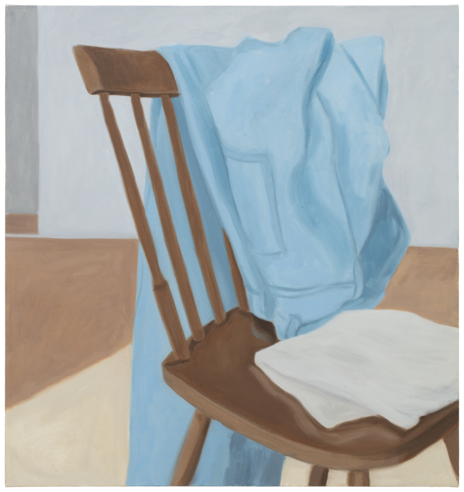 Everything piles up on this chair